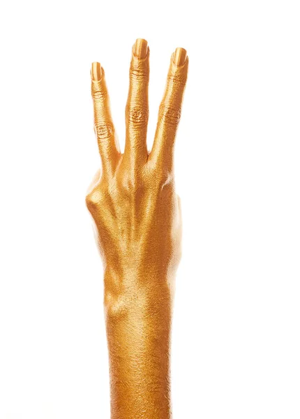 金泥の手 黄金の指 女性の手は白い背景に孤立した数を示している 手話だ 手札番号 — ストック写真