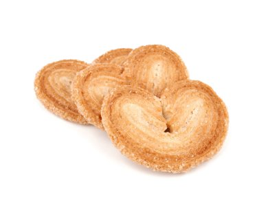 Puf böreği. Kalp şeklinde taze poğaça kurabiyeleri. Klasik Fransız hamur işleri. Domuz kulağı, fil kulaklı kurabiye, Fransız kalbi. Kalp şeklinde poğaça beyaz arkaplanda izole