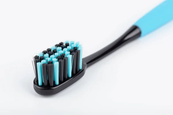 Blau Schwarze Zahnbürste Auf Weißem Hintergrund Mundgesundheit Körperpflege — Stockfoto