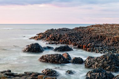 Sunset at Giants Causeway clipart