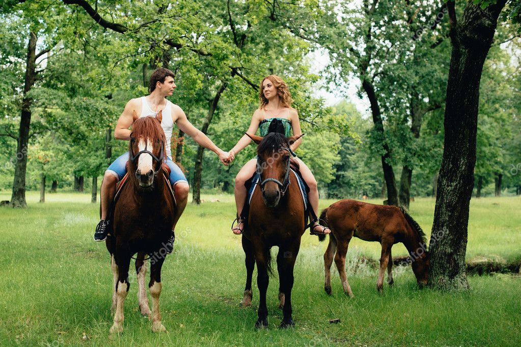 Lovers ride horses — Stock Photo © ShevarevAlex 116034814
