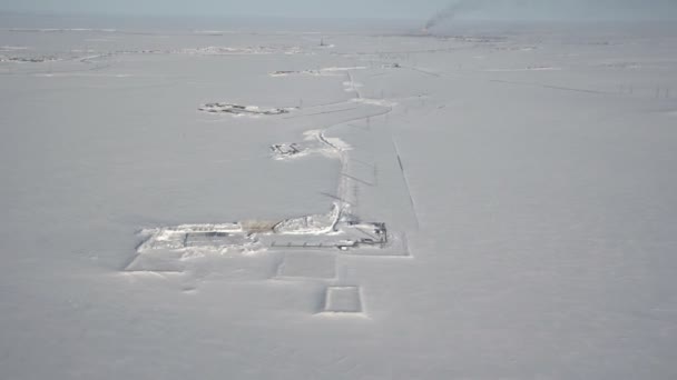 Oil field. Roads. Aerial view. Infrastructure. Construction of drilling wells. Winter. Mining Bush — Stock videók