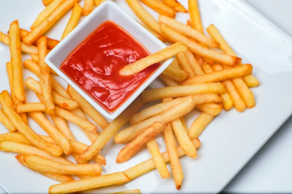 Fried Potato with tomato on white background — Stock Photo, Image