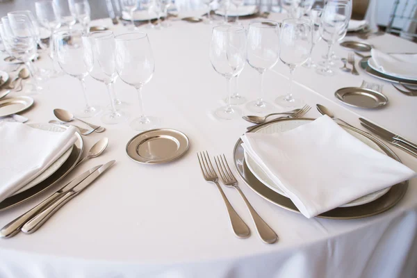 Elegant table set at fine restaurant Royalty Free Stock Photos