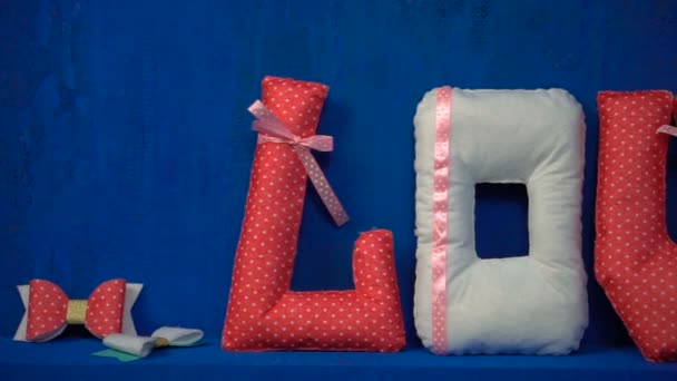 Love from felt letters on blue background — Stock Video