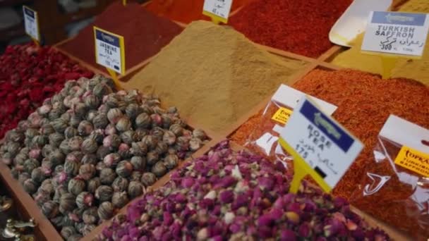 Spices and herbs on a counter of street shop Turkish Bazaar — Stock Video