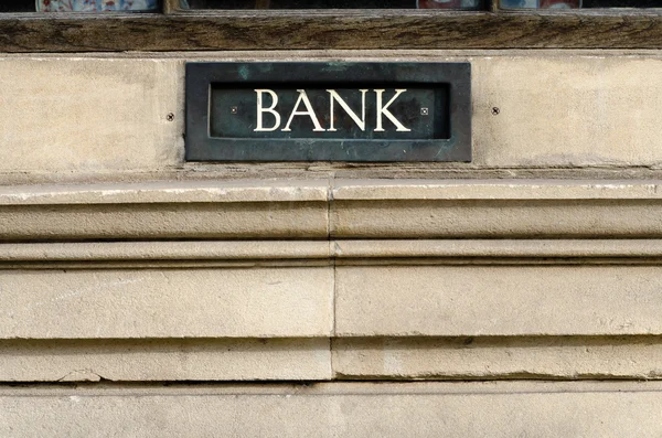 Bank sign painted on letterbox in wall — Stock Photo, Image