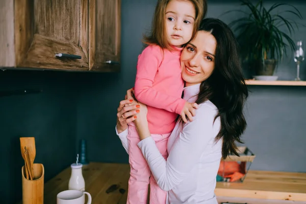 Adorable Young Woman Playing Her Little Funny Daughter Kitchen Portrait — Stock Photo, Image