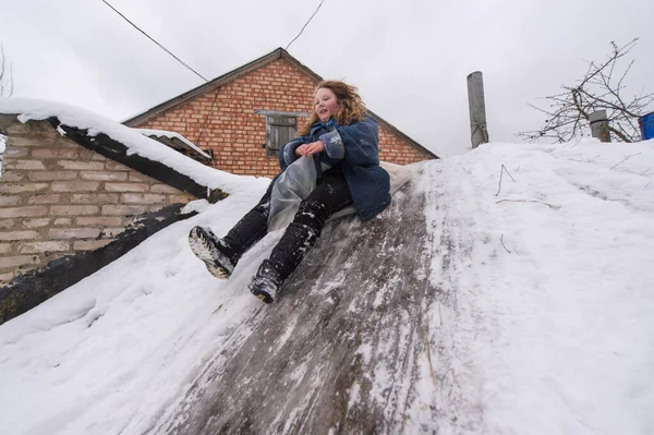 Cheerful Girl Using Plastic Bag Sled Riding Cellar Icey Trek — Stock Photo, Image