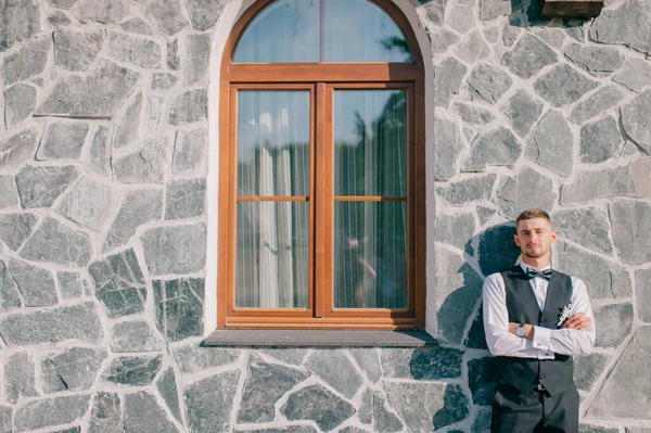 Elegant Groom Posing Stone Wall Window Background — Stock Photo, Image