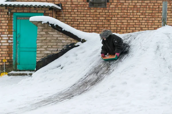 Funny Child Dressed Adult Oversized Jacket Riding Sled Icey Trek — Stock Photo, Image