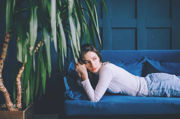 Picture Handsome Caucasian Model Lies Sofa Wants Relax — Stock Photo, Image