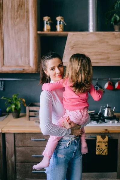 Adorable Young Woman Playing Her Little Funny Daughter Kitchen Portrait — Stock Photo, Image