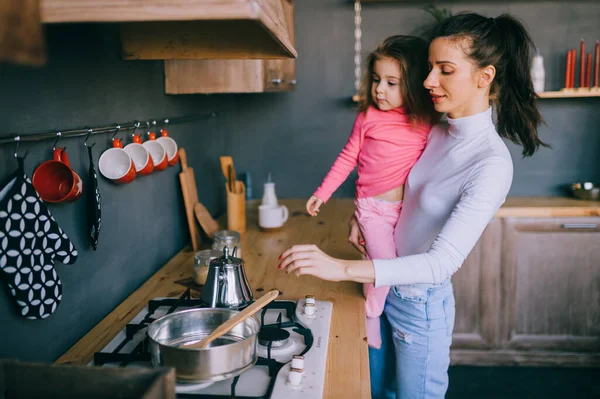 Adorable Young Woman Playing Her Little Funny Daughter Kitchen Portrait — Stock Photo, Image