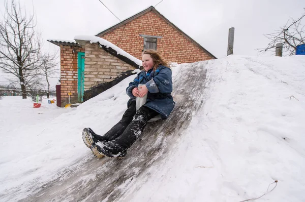 Cheerful Girl Using Plastic Bag Sled Riding Cellar Icey Trek — Stock Photo, Image