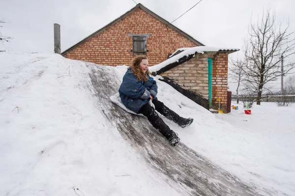 Cheerful Girl Using Plastic Bag Sled Riding Cellar Icey Trek — Stock Photo, Image