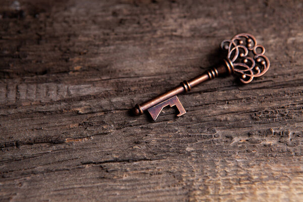 old key on a wood table