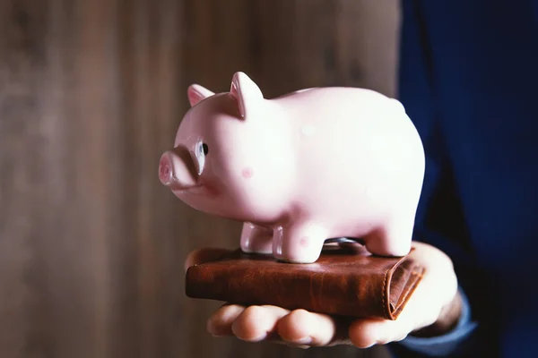 Businessman Holding Wallet Piggy Bank — Stock Photo, Image