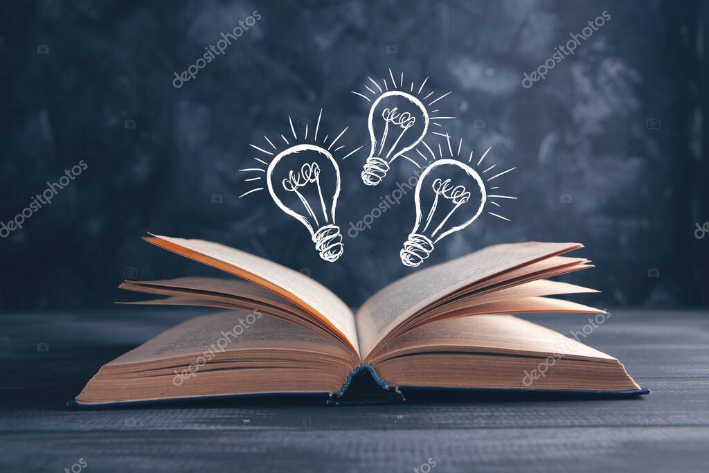 Knowledge and wisdom, light bulb on the book