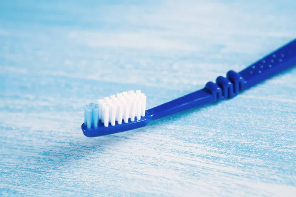Οδοντόβουρτσα Μπλε Φόντο — Φωτογραφία Αρχείου