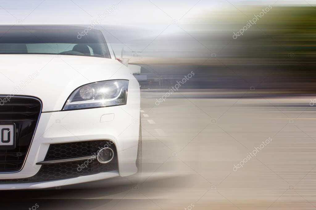 white sports car with blur effect
