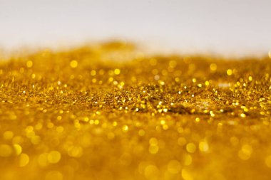 Altın glitter doku doğum günü, yıldönümü, düğün, yeni yıl arifesi ya da Noel için arka plan Derma bulanık.