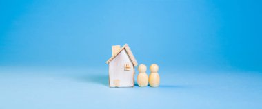 Minyatür insanlar, ev modeli, iş adamı, iş adamı, gayrimenkul kavramı.