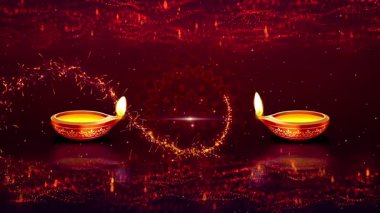 İki geleneksel Hint yağı lambası Diwali kutlamalarını ve ruhsal ışığı sembolize eden karanlık, şenlikli bir arka planı aydınlatıyor..