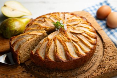 Whole-wheat cake with baked pear and cinnamon. Step-by-step recipe to learn how to cook.