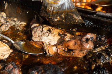 Recado Negro is a dish with meat and a mixture of dried chilies and other spices typical of the Yucatan Peninsula in Mexico.