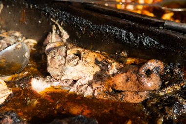 Recado Negro is a dish with meat and a mixture of dried chilies and other spices typical of the Yucatan Peninsula in Mexico.