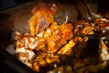 Authentic cochinita pibil recipe in a dish and tacos typical of the Yucatan Peninsula in Mexico.