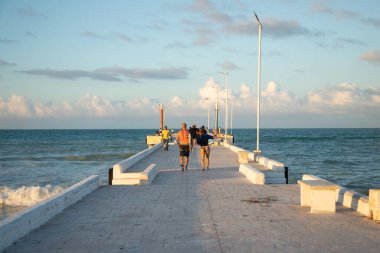 El Cuyo, Mexico; November 1, 2025: Footbridge leading to the sea in a Yucatan fishing village.