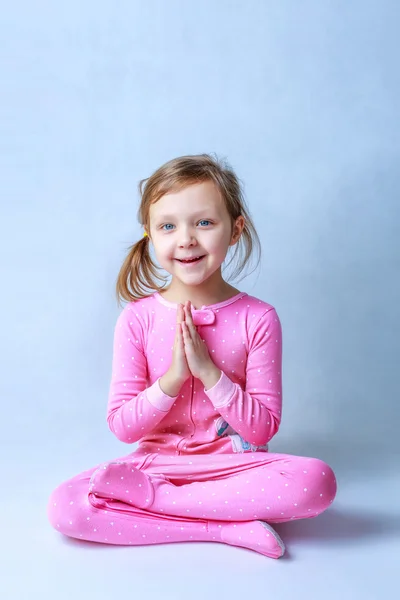 girl in pink yoga