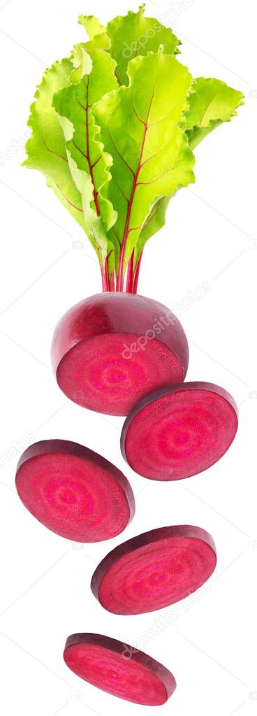 Isolated flying beetroots. Falling sliced beetroot with leaves isolated on white background, with clipping path