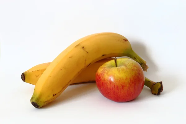 Bananas and apple isolated on white — Stock Photo, Image