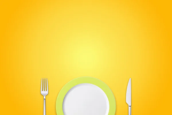 Plate with fork and knife on mango background — Stock Photo, Image