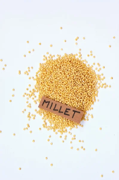 Millet com o rótulo no fundo branco — Fotografia de Stock