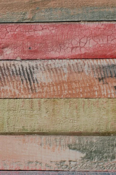Groen, rood en oranje geschilderd oud houten achtergrond — Stockfoto
