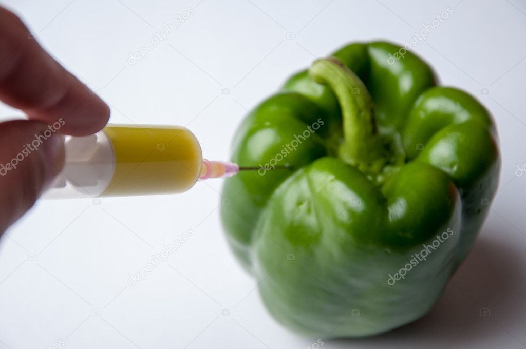 GMO green pepper and syringe