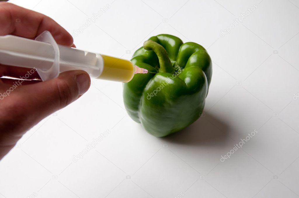 GMO green pepper and syringe