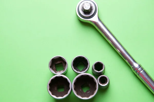 La imagen de las herramientas sobre un fondo verde — Foto de Stock