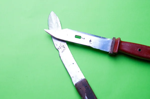 La imagen del cuchillo unting sobre fondo agreen —  Fotos de Stock