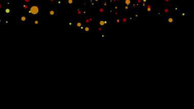 Renkli yuvarlak konfetilerin karanlık arka plana düşüşünün soyut animasyonu. Sarı, turuncu ve kırmızı daireler parti, tatil, yeni yıl, doğum günü veya kutlama videoları için mükemmel bir ışık efekti oluşturur..