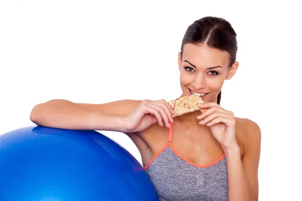 Eating her favorite after-workout snack. — Stock Photo, Image