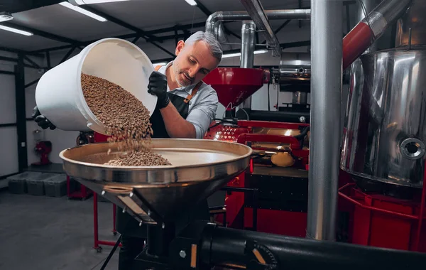 Coffee Roaster Master Pouring Coffee Beans Roasting Machine Front View — Stock Photo, Image