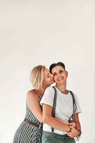 Portrait Smiling Two Lesbian Women One Kisses Another Cheek White — Stock Photo, Image