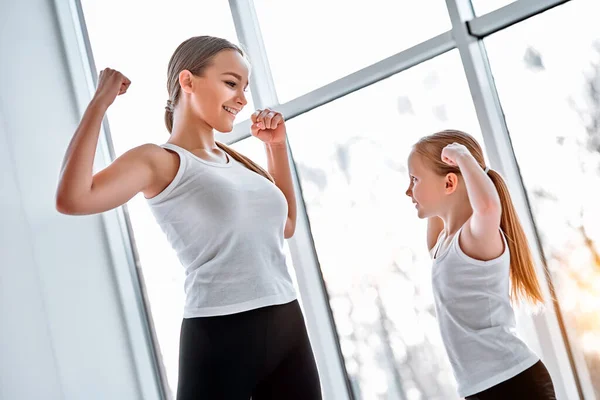 Mother Daughter Showing Strong Hands Gym Mothership Family Concept — Stock Photo, Image