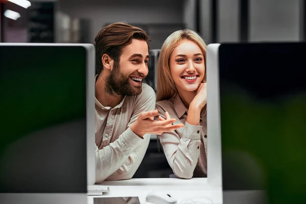 Two Young Business People Sitting Computers Office Looking Monitor Screen — Fotografia de Stock