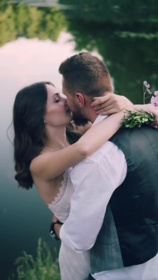Happy newlyweds in nature. — Stock Video